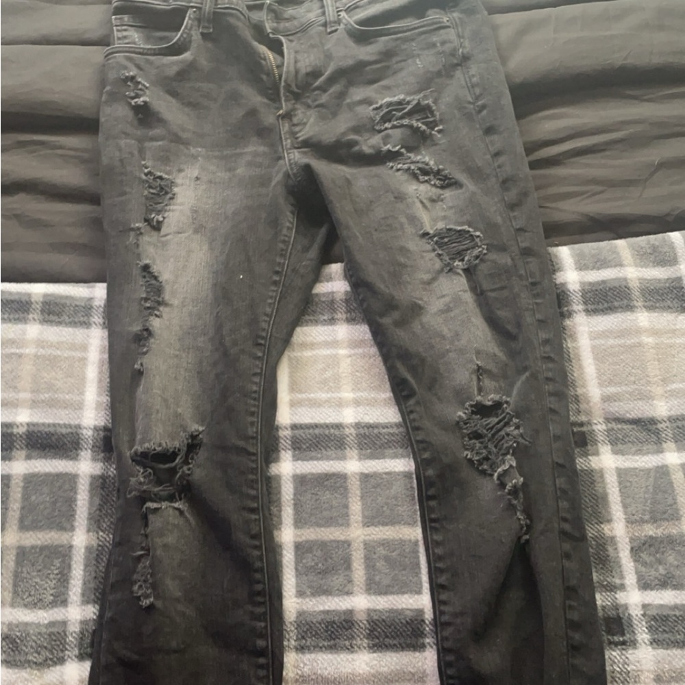 Black skinny jeans with rips